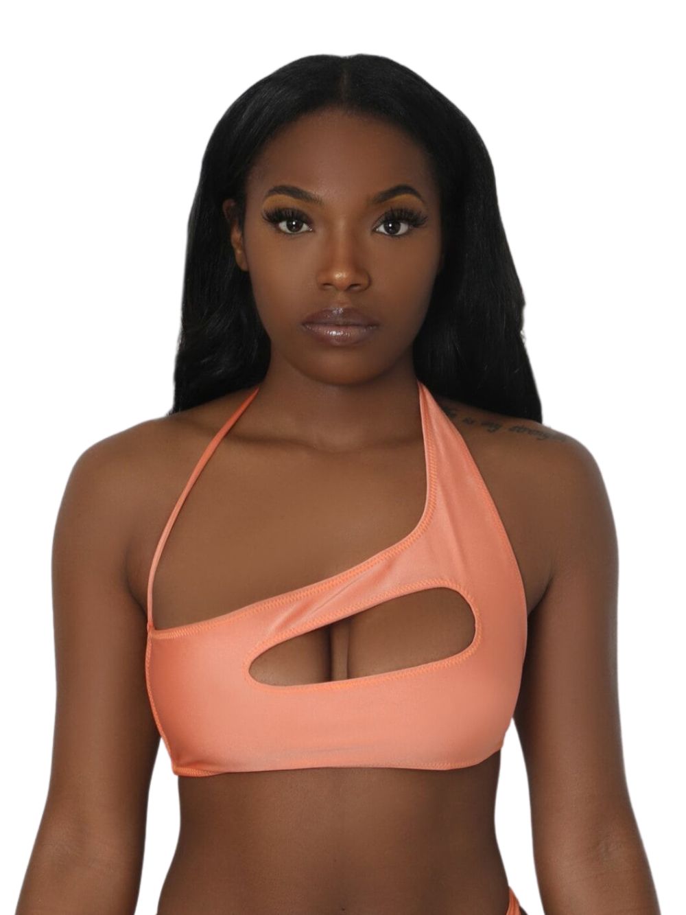 woman wearing asymmetrical swimsuit top with front cutout